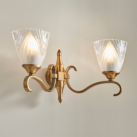 Photo of Cua twin wall light in antique brass with deco glass