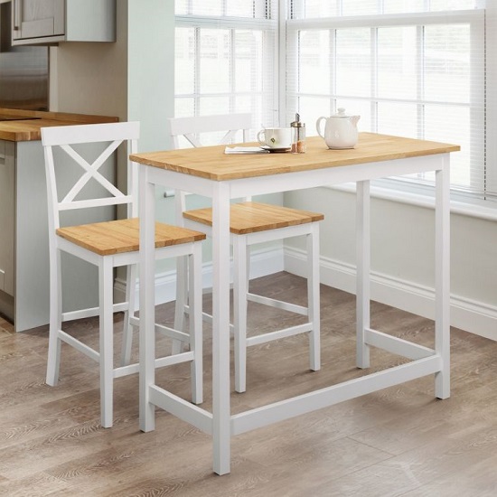 Photo of Macall wooden bar table in light oak effect with two bar stools