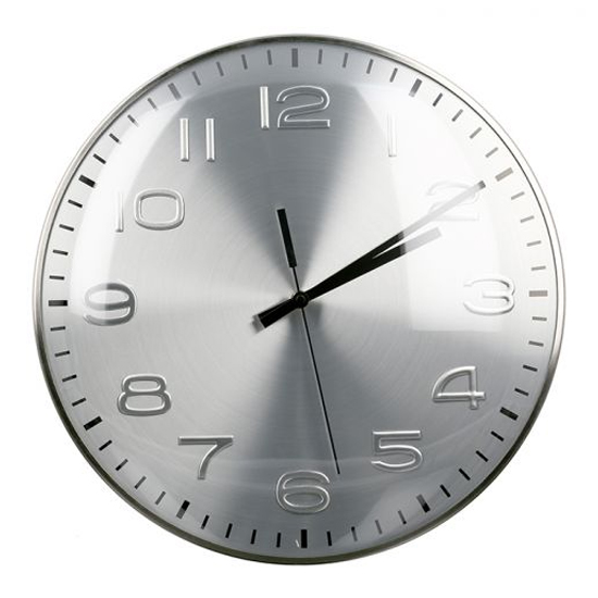 Read more about Curved glass wall clock with silver metal frame