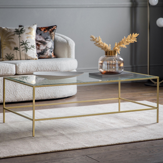 Photo of Custer clear glass coffee table with champagne metal frame