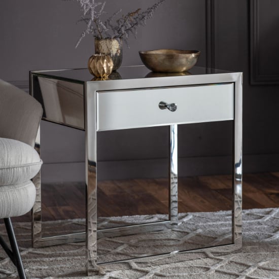 Read more about Cutlier mirrored side table with steel legs in silver