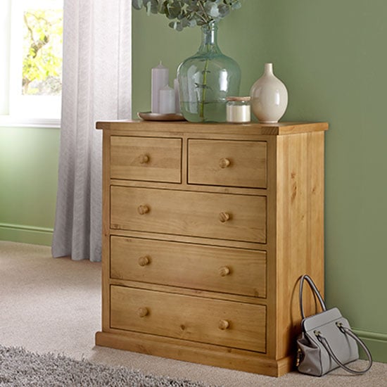 Photo of Cyprian wooden chest of drawers in chunky pine with 5 drawers