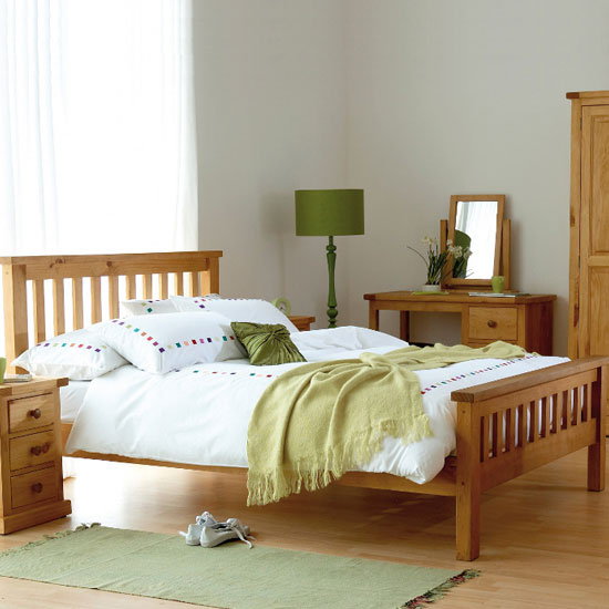 Photo of Cyprian wooden king size bed in chunky pine