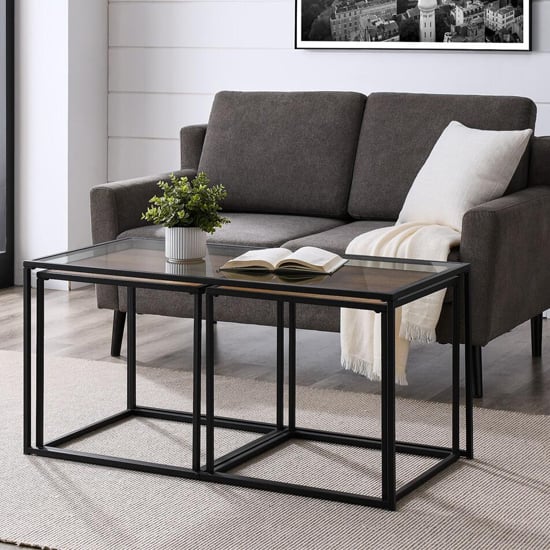 Product photograph of Danbury Clear Glass Nesting Coffee Tables With Black Steel Frame from Furniture in Fashion
