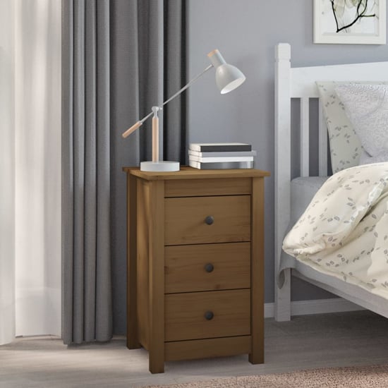 Read more about Danik pine wood bedside cabinet with 3 drawers in honey brown