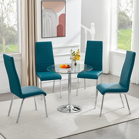 Photo of Dante round clear glass dining table with 4 dora teal chairs