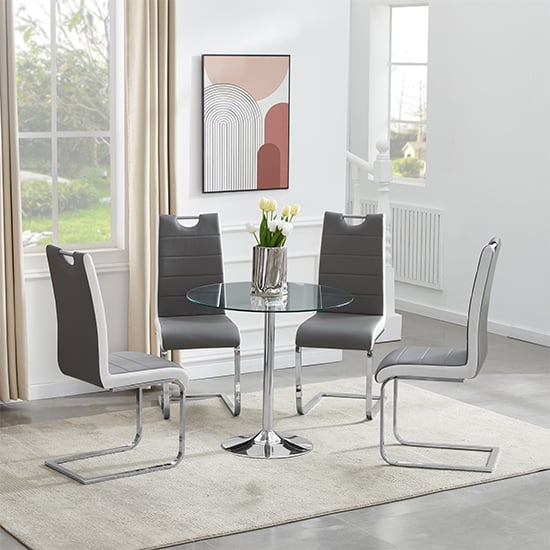 Product photograph of Dante Round Glass Dining Table With 4 Petra Grey White Chairs from Furniture in Fashion