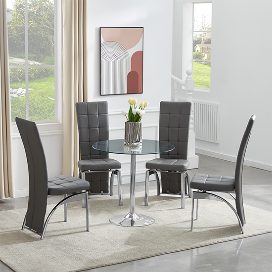 Photo of Dante round glass dining table with 4 ravenna grey chairs