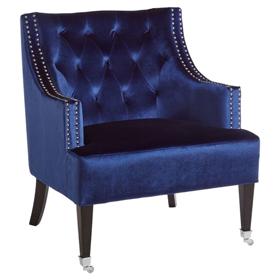 Photo of Darligo upholstered velvet armchair in blue