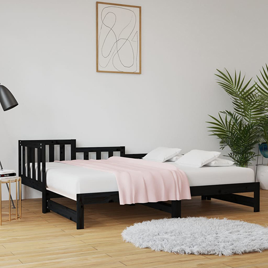 Product photograph of Davey Solid Pinewood Pull-out Single Day Bed In Black from Furniture in Fashion