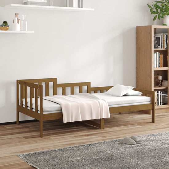 Product photograph of Davey Solid Pinewood Single Day Bed In Honey Brown from Furniture in Fashion