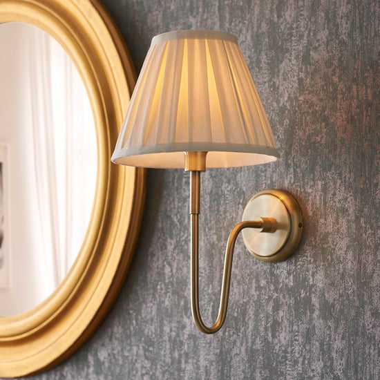 Read more about Davis and carla cream cotton shade wall light in antique brass