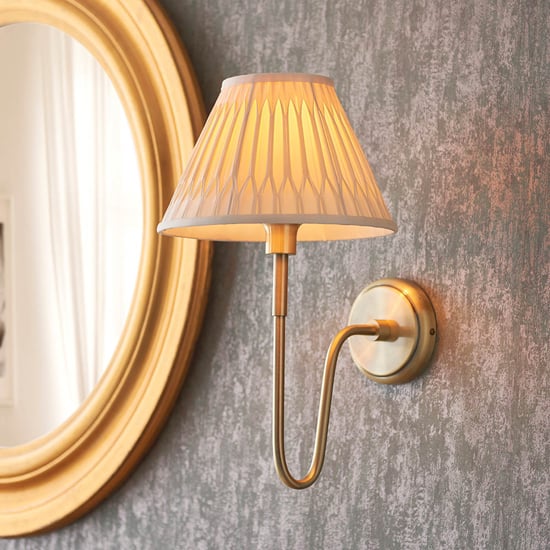 Photo of Davis and chatsworth ivory shade wall light in antique brass