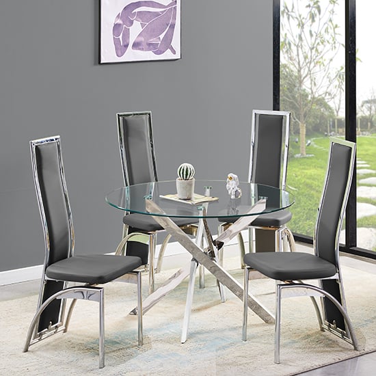 Photo of Daytona round glass dining table with 4 chicago black chairs