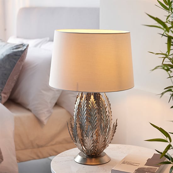 Product photograph of Delphine Leaf Table Lamp In Silver With Ivory Shade from Furniture in Fashion