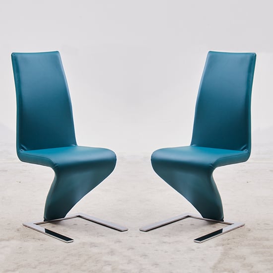 Photo of Demi z teal faux leather dining chairs with chrome feet in pair