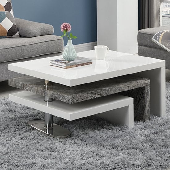 Read more about Design rotating white gloss coffee table in melange marble effect