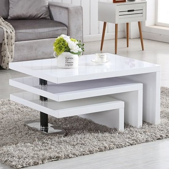 Photo of Design rotating high gloss coffee table with 3 tops in white