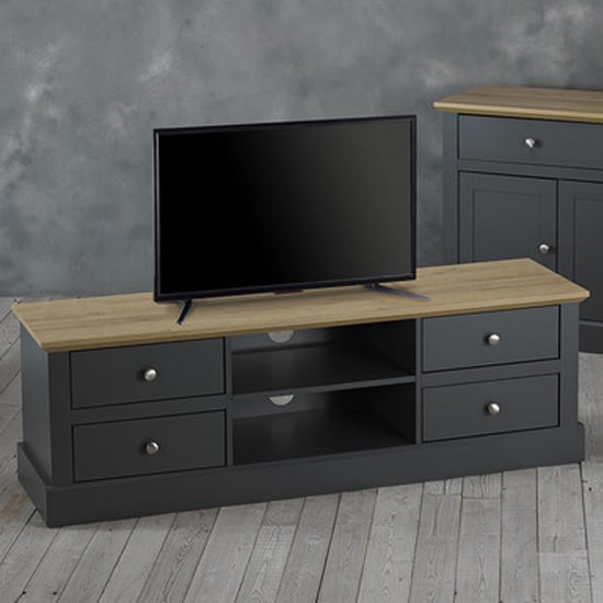 Photo of Devan wooden tv stand with 4 drawers in charcoal