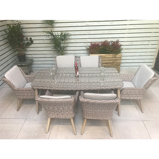 Photo of Deven outdoor rectangular dining table with 6 chairs in fine grey