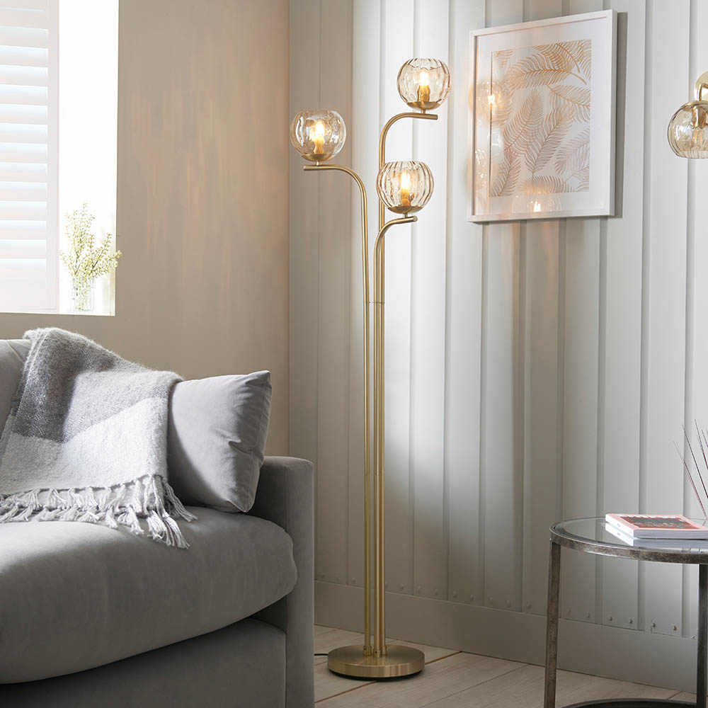 Read more about Dimple 3 light champagne glass shade floor lamp in brass