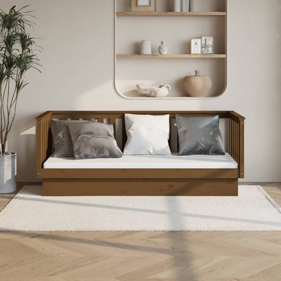 Photo of Diza pinewood single day bed in honey brown