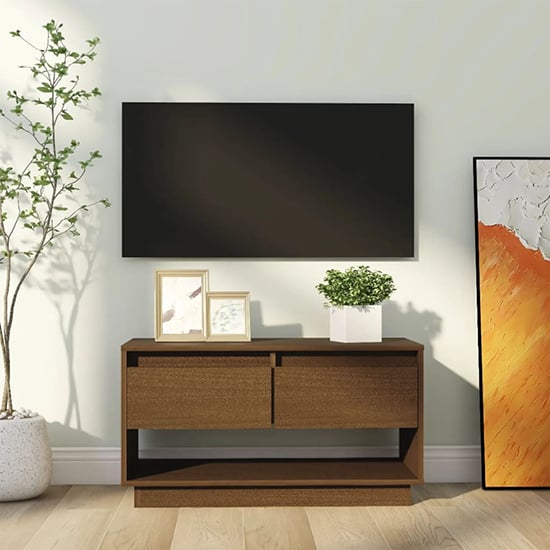 Read more about Doric solid pinewood tv stand with 2 drawers in honey brown