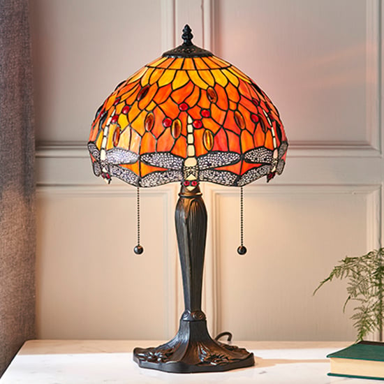 Photo of Dragonfly flame small tiffany glass table lamp in dark bronze