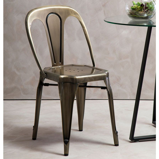 Photo of Dschubba metal dining chair in brass