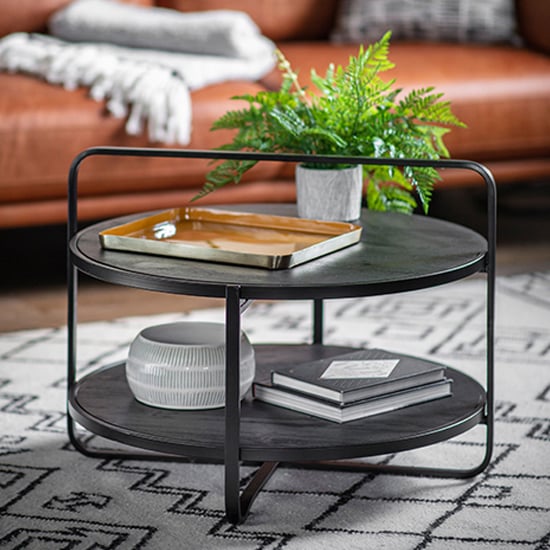 Photo of Dudley round wooden coffee table with metal frame in black