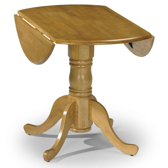 Photo of Damara round drop-leaf wooden dining table in honey