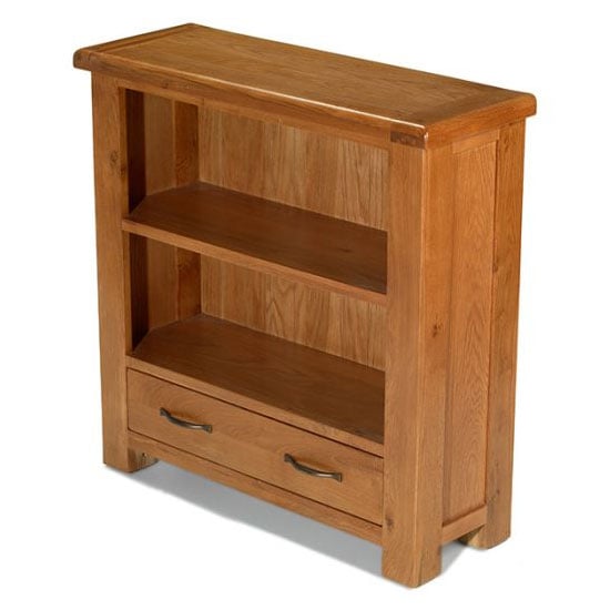 Photo of Earls wooden low bookcase in chunky solid oak with 1 drawer