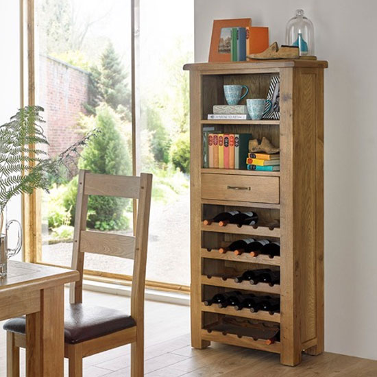 Photo of Earls wooden tall wine rack in chunky solid oak with 1 drawer