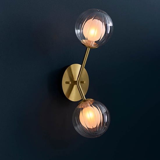 Read more about Easton clear ribbed and frosted glass wall light in satin brass