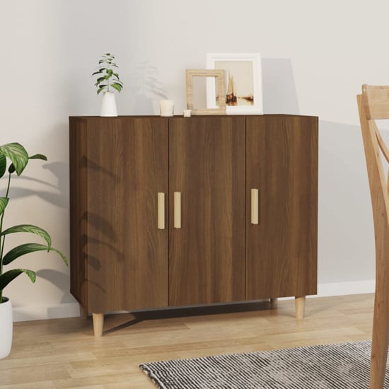 Photo of Ediva wooden sideboard with 3 doors in brown oak