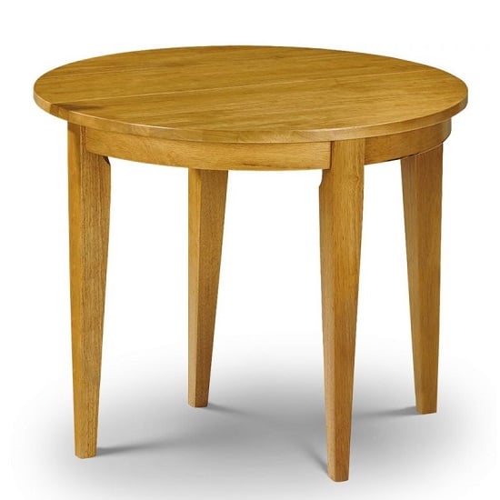 Read more about Elissandro round extending wooden dining table in honey pine