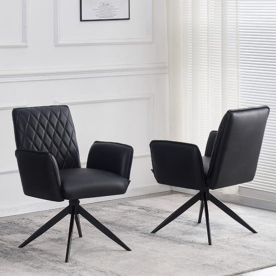 Read more about Elkin black faux leather dining chairs in pair