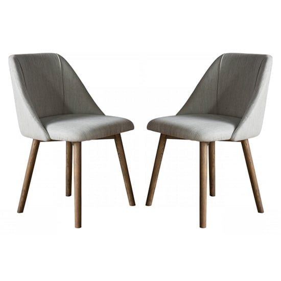 Read more about Elliata natural fabric dining chairs in a pair