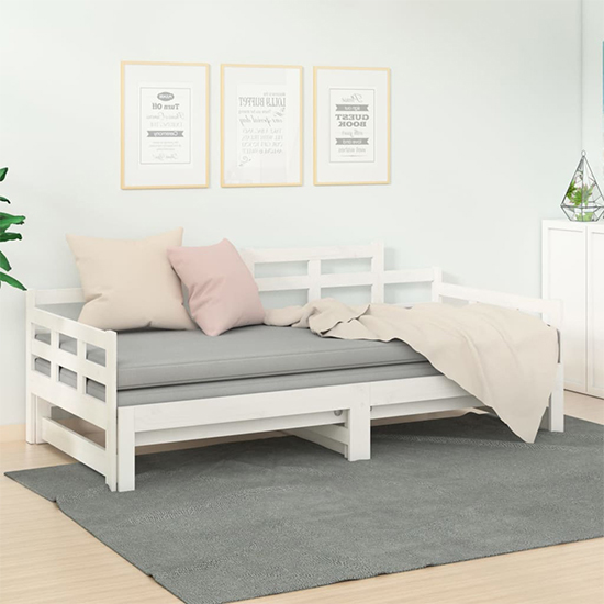 Photo of Elstan solid pine wood pull-out single day bed in white