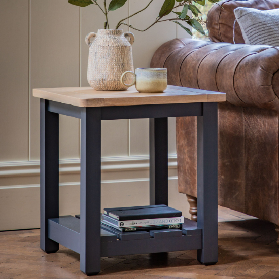 Photo of Elvira round wooden side table in oak and meteror