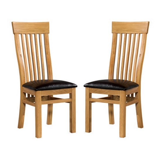 Photo of Empire solid oak dining chairs in pair