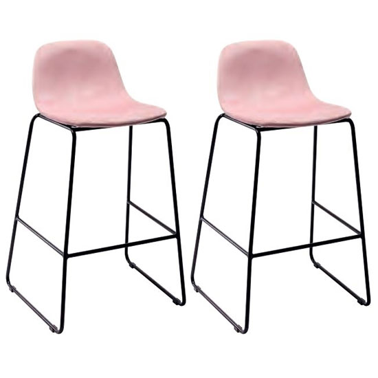 Photo of Emporia blush pink velvet bar stools with metal legs in a pair