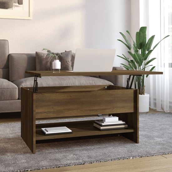 Photo of Engin lift-up wooden coffee table in brown oak