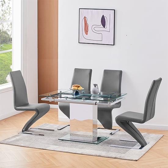 Photo of Enke extending glass dining table with 4 demi z grey chairs