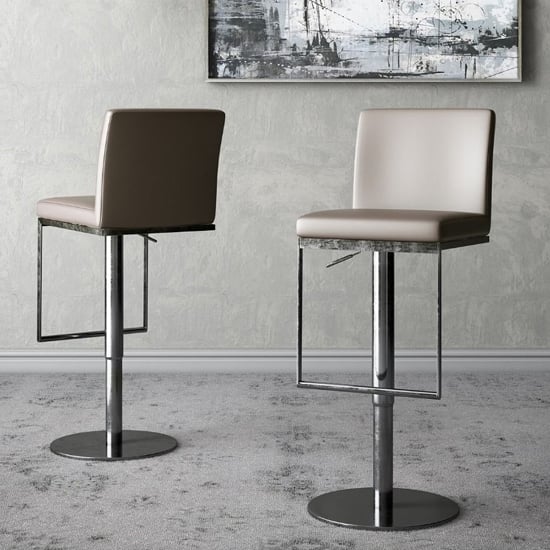 Photo of Eccles taupe faux leather gas-lift bar stools in pair