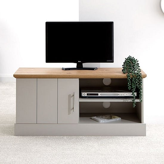 Photo of Kirkby wooden small tv stand in grey with oak effect top