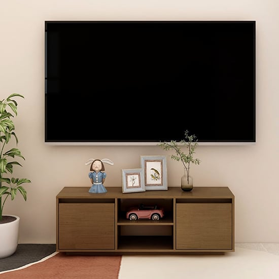 Read more about Eurus solid pinewood tv stand with 2 doors in honey brown