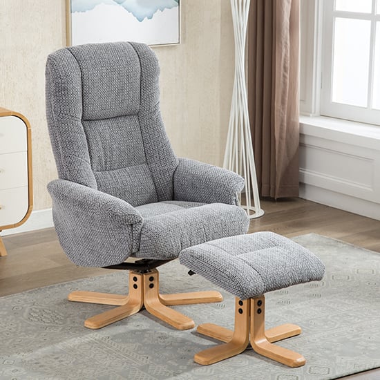 Photo of Fairlop fabric swivel recliner chair and footstool in lake blue