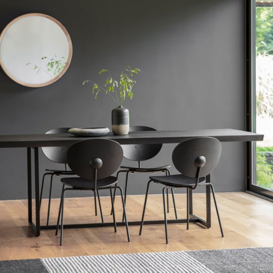 Read more about Fardon wooden dining table with metal frame in brushed black