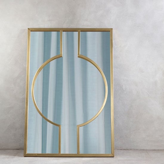 Photo of Farota rectangular wall bedroom mirror in champagne gold frame